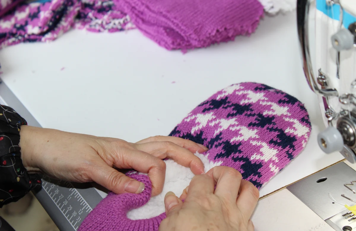 AIGE factory sewing detail